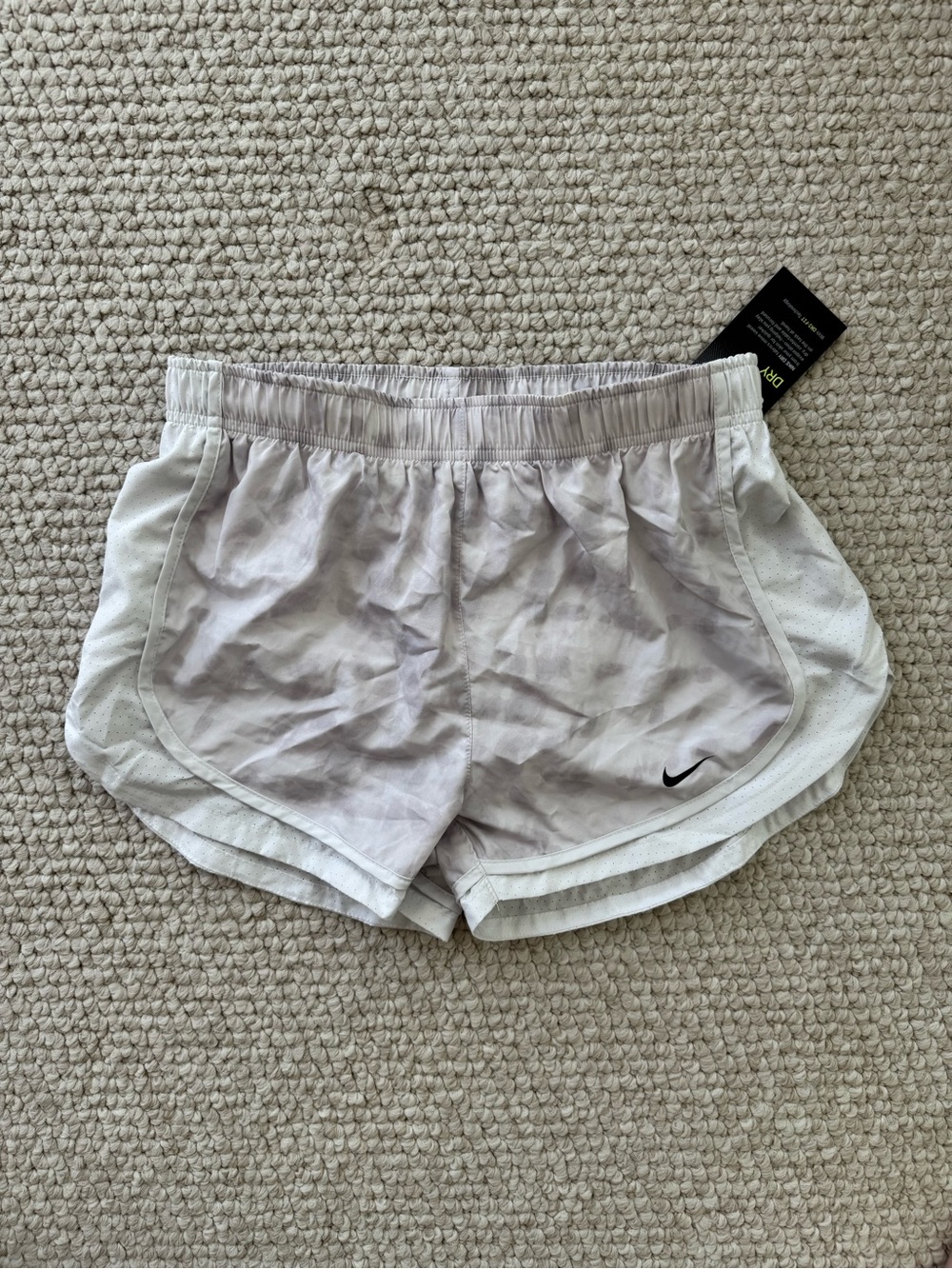 Nike Women’s Light Gray Athletic Shorts with Black Swoosh